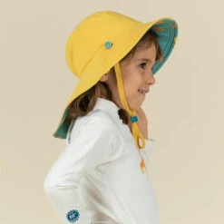 Chapeau Anti UV Bébé Réversible Jaune Et Bleu Imprimé SAVANE -Magasin De Surf chapeau anti uv bebe reversible jaune et bleu imprime savane 3